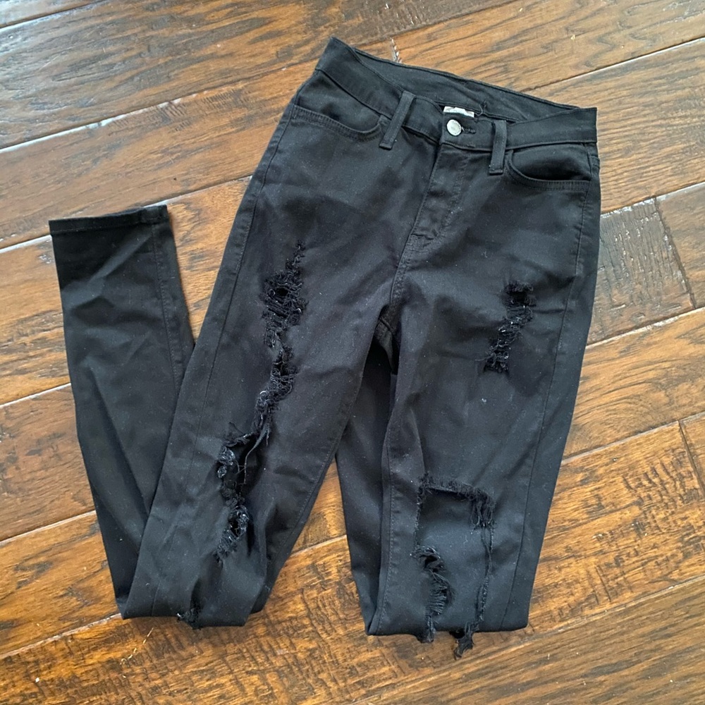 black ripped jeans